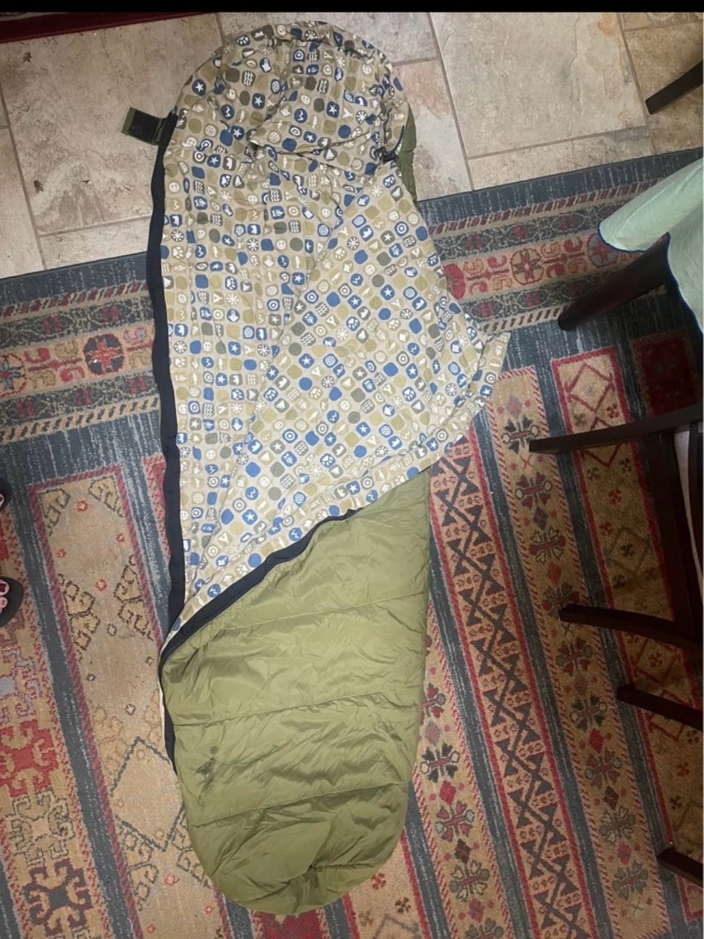 Kid’s REI Sleeping Bag with Patterned Lining
5 ft length
Unused,with stuff sack